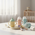 Luxe Baby Complete Feeding Set with pastel bottles, sippy cup and silicone spoons